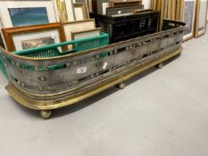19th cent. Brass pierced fender with later collection of fire tools. 46ins.