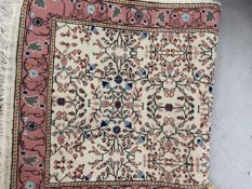 Carpets & Rugs: 20th cent. Kazak brown ground, four guls with geometric design, sixteen borders.