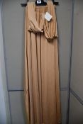 One as new Victoria Lou wrap around beige dress. Size unknown.
