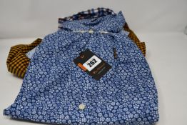 One men's as new Ben Sherman Short Sleeve Floral Print shirt size 2XL. One men's as new Ben