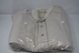 Two as new 'We The People' beige denim vest with fur size XS.