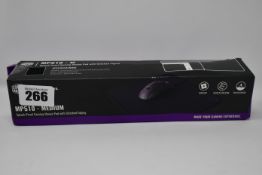 A boxed as new Cooler Master MP510-M Mouse pad with stitched edge.