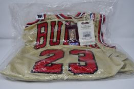 One as new Mitchell & Ness Michael Jordan 1995 Gold Authentic Jersey Chicago Bulls size XL (