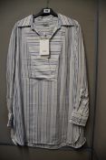 An as new Co Los Angeles blue striped pop over shirt spring-summer 2020 (UK S).