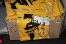 A large quantity of Precision Training Olympico Shirts (Colour: yellow/green/black).