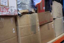 Eight boxes of clothing and related items.