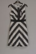 An as new Karl Lagerfeld sleeveless chevron lace dress (Size US 2).