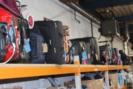 A quantity of empty suitcases.