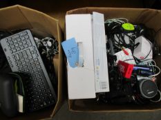 Two boxes of assorted pre-owned cables and small electrical items.