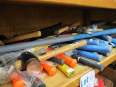 One shelf of assorted hammers and related (Approximately 30 items).