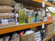 Two shelves of miscellaneous food, drink, confectionery and related items.