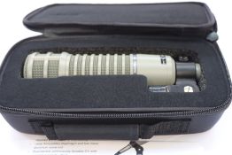 A boxed Electro Voice RE20 Dynamic Cardioid Microphone.