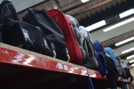 A quantity of empty suitcases/holdalls.