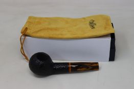 An as new Savinelli 1876 Tigre Rusticated black 9mm pipe (RRP €110).