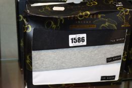 Four boxed as new Ted Baker 3 T-shirt gift sets (medium).