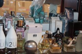 A quantity of part used eau de parfum/toilett and testers to include YSL, Gucci, Hugo Boss, Calvin