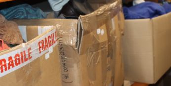 Six boxes of assorted clothing and related items.