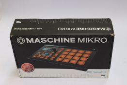 A boxed Maschine Mikro groove production studio.
