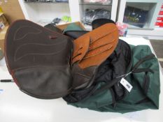 A Grey Reynolds riding saddle in brown leather.