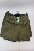Eleven pairs of ladies as new Tencel Khaki Shorts in various sizes.