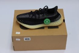 A pair of as new Adidas Yeezy Boost 350 V2 trainers (UK 7).