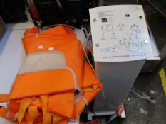 A Lasersystem commercial body slimming suit with air pressure unit.