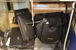 One Ricky Black Round Belt Bag, one Hailey Folio in black and gold, one AirPod Pro pouch in black
