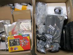 Two boxes of assorted new and pre-owed small electrical items and accessories.