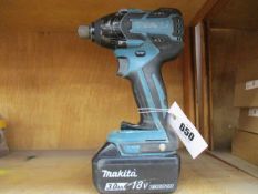 A pre-owned Makita DTD129 18V Impact Wrench with battery (No charger).
