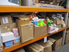 One shelf of miscellaneous toys and related items.