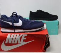 Two pairs of as new Nike trainers; SB Charge (UK 6) and MD Runner 2 (UK 10).