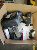 A box of assorted as new and pre-owned small electrical items and accessories.