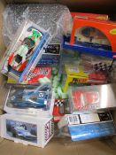 A large quantity of slot miniature cars to include Policar CAR05a, Policr CAR04b, Scalextric C4031