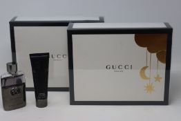 Three as new Gucci Guilty pour homme gift sets (Eau de toilette 50ml and shower gel 50ml, one box