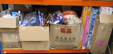 A shelf of assorted as new toys to include puzzles, games, Disney figures, soft toys and related