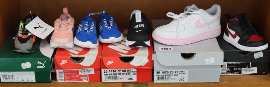 Four pairs of toddlers/children's Nike trainers, a pair of toddler Adidas trainers (No box) and a