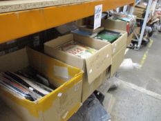 A quantity of books and vinyl.