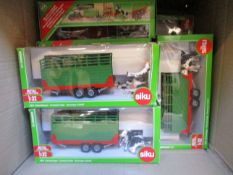 Thirteen boxed Siku 2875 Livestock Trailers.