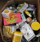 A box of assorted as new/used beauty and assorted toiletries and related items.