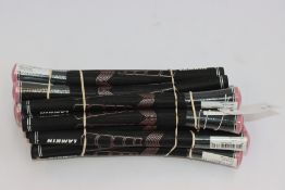 Twenty as new Lamkin Sonar undersize-plus golf club grips in black/pink.