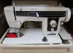 A pre-owned Deluxe ZigZag New Home semi industrial upholstery sewing machine.