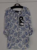 An as new The Kooples flowered top (Size 1 - RRP £118).