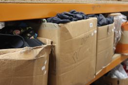 Five boxes of assorted clothing and related items.