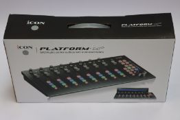 A boxed Icon Platform M Midi/Audio control surface with motorized faders.