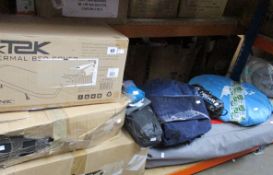 A collection of camping equipment to include: several bagged tents, camping chair, inflatable