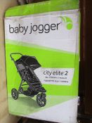 A boxed as new BabyJogger City Elite 2 Pushchair in Carbon Grey (Some damage to outer box. Item