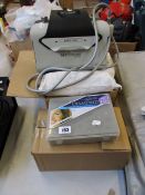 A commercial Ecleris Minivac Crystal-Free diamond tip microdermabrasion machine with accessories.