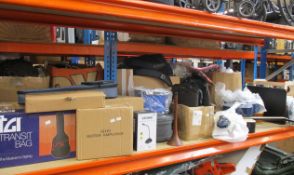 One shelf of musical instruments and accessories to include an Auden acoustic guitar case, a boxed