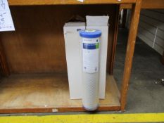 Four Pentair EP-20BB carbon block filter cartridges.