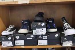 Five pairs of assorted as new Converse footwear.